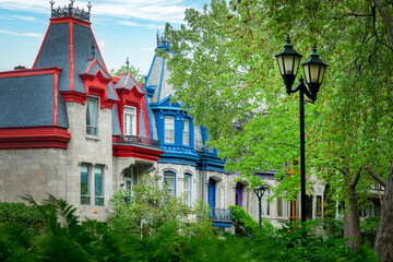 Naklejka premium Colorful victorian houses in Le plateau Mont Royal borough in Montreal, Quebec