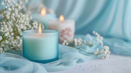 Obraz na płótnie Canvas scented blue aroma candles on a blue background 