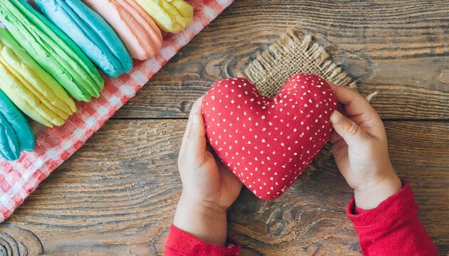 valentines day kids crafts hand holding play dough heart vertical