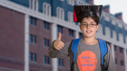 graduate holding diploma