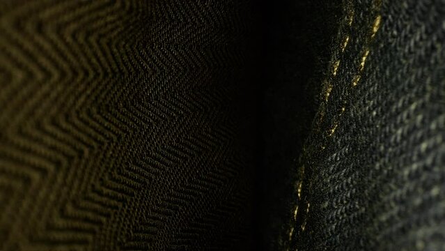 Denim jeans fabric close up shot, out of pocket 