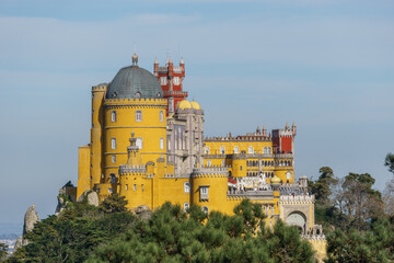 Palace of Penaon top of a hill between forest in Sintra. Lisbon, Portugal