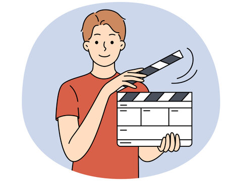 man holding clapperboard, red shirt, film making clip art preview