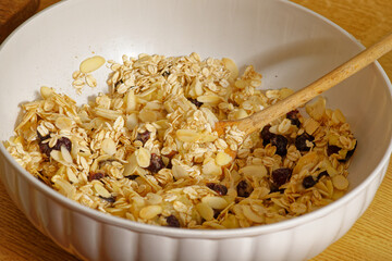 Stirring ingredient preparing oatmeal bar