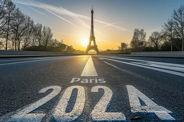 Fotobehang Sunrise Behind the Eiffel Tower with "Paris 2024" Road Marking © Virginie Verglas