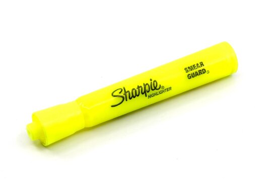 Neon highlighter type writing marker. Sharpie brand yellow highlighter 