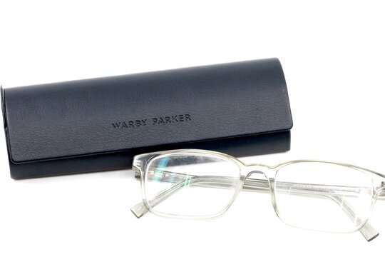 Warby Parker Eyeglasses and storage case.