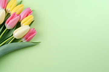 Mother's Day, Women's Day concept. Top view photo of pink yellow and white tulips on isolated light green background with copyspace Generative AI