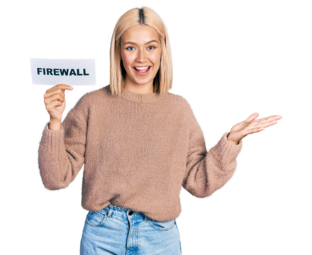 Beautiful young blonde woman holding firewall banner celebrating achievement with happy smile and winner expression with raised hand