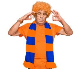 Senior hispanic man football hooligan cheering game relax and smiling with eyes closed doing meditation gesture with fingers. yoga concept.