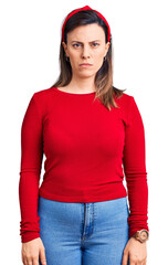 Young beautiful woman wearing casual clothes skeptic and nervous, frowning upset because of...