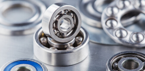 different bearings on a metal background. Part of mechanism.