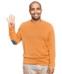 Hispanic adult man wearing casual winter sweater showing and pointing up with fingers number four while smiling confident and happy.