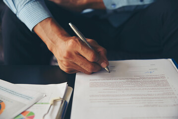 Concept Signing agreement contract. Business man with marketing team to sign contract agreement on...