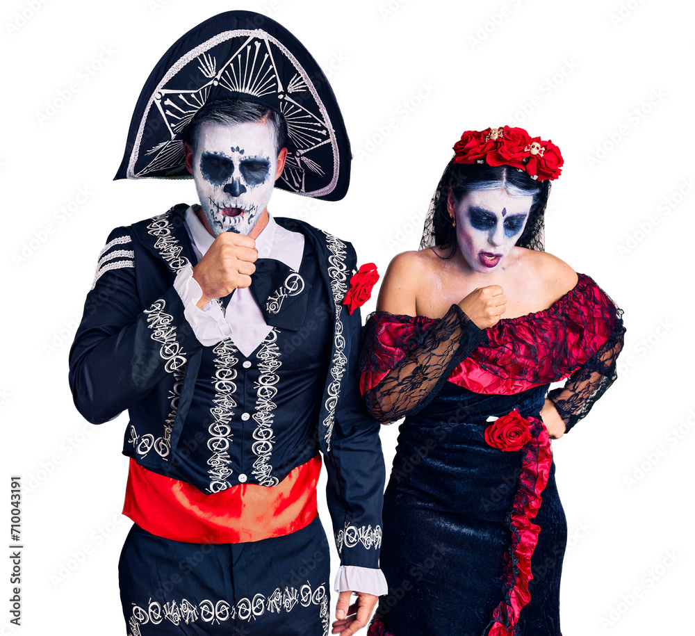 Sticker young couple wearing mexican day of the dead costume over background feeling unwell and coughing as 