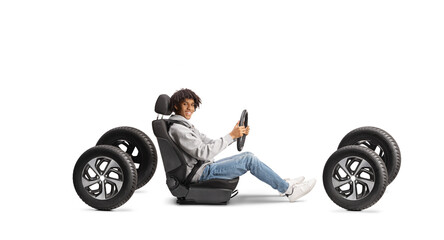 African american young man in a car seat on four tires