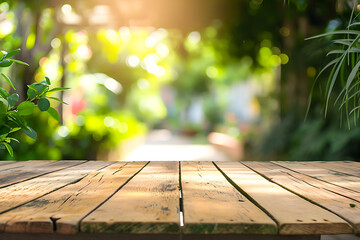 Empty wooden table with blurred garden in the background in spring