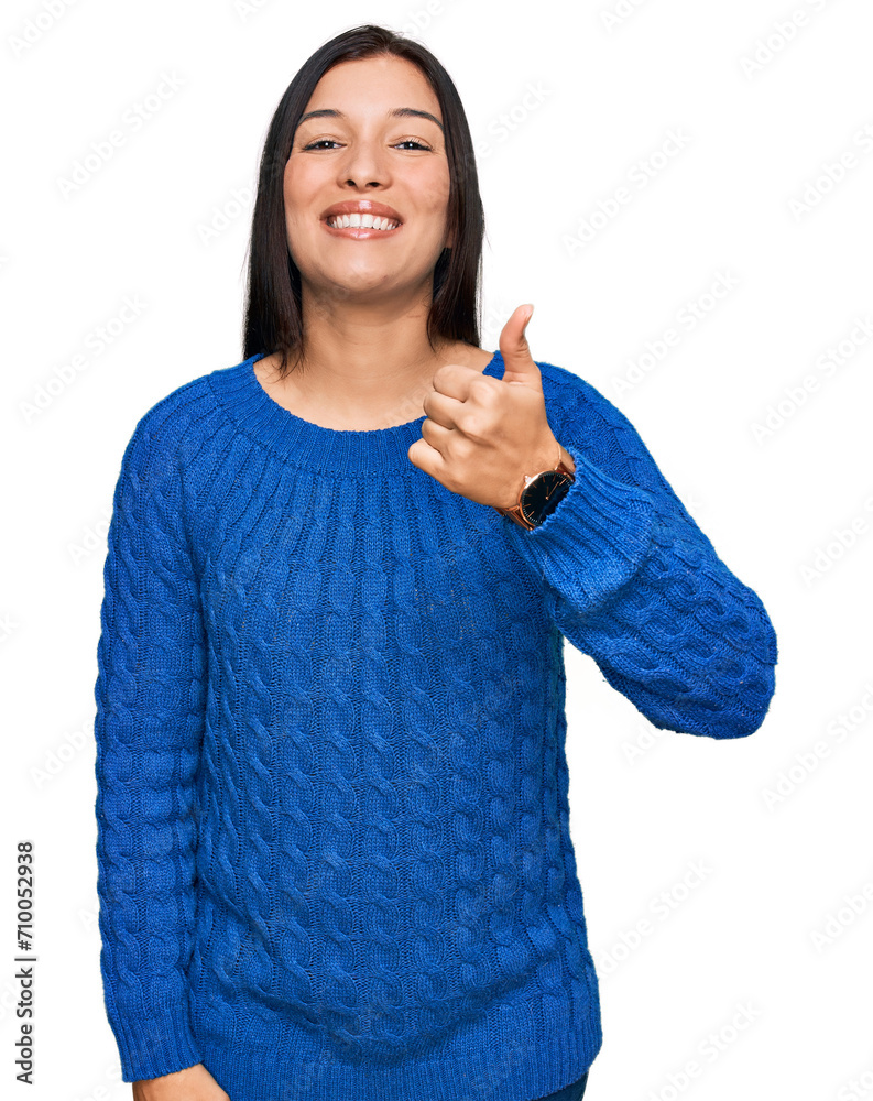 Canvas Prints young hispanic woman wearing casual clothes doing happy thumbs up gesture with hand. approving expre