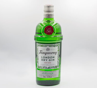 Tanqueray London dry gin bottle closeup against white.