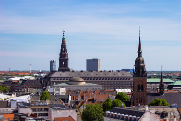 Christiansborg Slot Palace, Church of Holy Ghos and beautiful historical buildings in center of Copenhagen, Denmark. View from Round Tower (Danish: Rundetaarn)