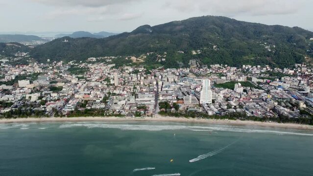 Aerial drone view of Patong skyline showing the beach and town on phuket's west coast it is the main tourist resort on the island and is the centre of the islands nightlife 4k high resolution quality