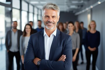 Portrait of a mature businessman posing in modern office
