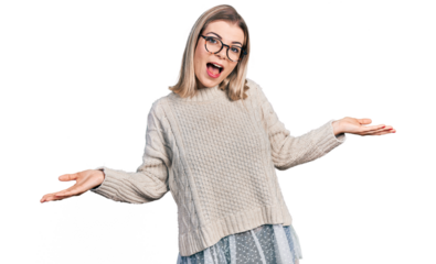 Young blonde woman wearing glasses smiling cheerful offering hands giving assistance and acceptance.