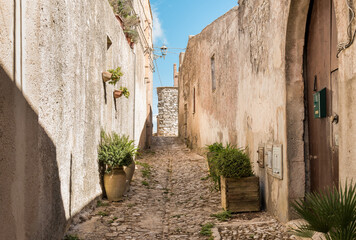 Narrow cobblestone street in the historical center of Erice, province of Trapani in Sicily, Italy