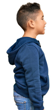 Little boy hispanic kid wearing casual sporty jacket looking to side, relax profile pose with natural face with confident smile.