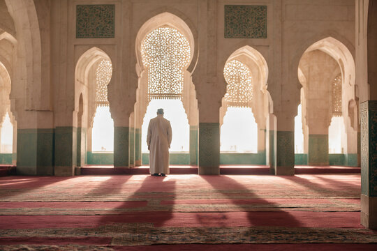Muslim man praying in a mosque, Masjed, Ramadan holy month, fasting, Islamic background