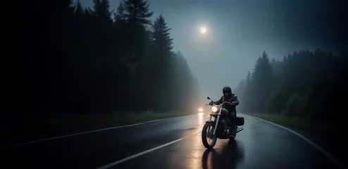 Foto auf Acrylglas Motorrad biker rides a custom chopper motorcycle at night along a road in the fog.