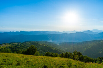 Fototapeta premium Carpathians mountains landscapes from green meadow on sunset, Apetska mountain, Ukraine