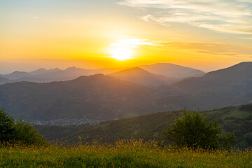 Carpathians mountains landscapes from green meadow on sunset, Apetska mountain, Ukraine
