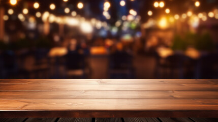 Wooden table in front of abstract blurred restaurant lights background - obrazy, fototapety, plakaty