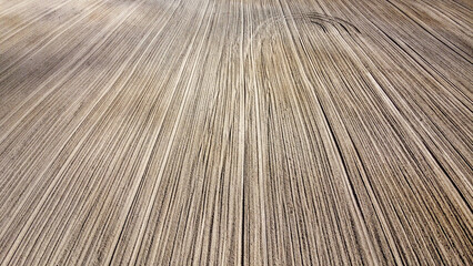 Obraz premium Plowed agricultural field, aerial view. Agricultural land. Background.