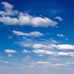 A vast blue sky with white clouds.