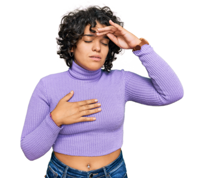 Young hispanic woman with curly hair wearing casual clothes touching forehead for illness and fever, flu and cold, virus sick
