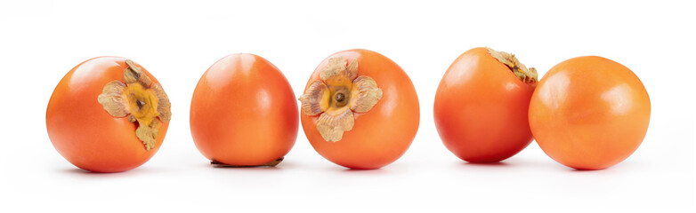 Five persimmons in a row isolated on white background. - 710119501