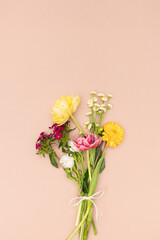 bouquet of flowers on blush pink background