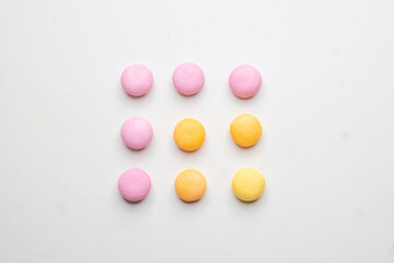 Close up a Few Gum Balls Isolated color Blue, Green, Yellow, on a White Background