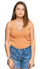 Obraz premium Young caucasian woman wearing casual clothes depressed and worry for distress, crying angry and afraid. sad expression.