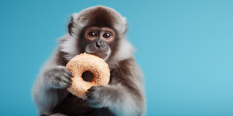 A monkey with a donut in its mouth, pastel colors