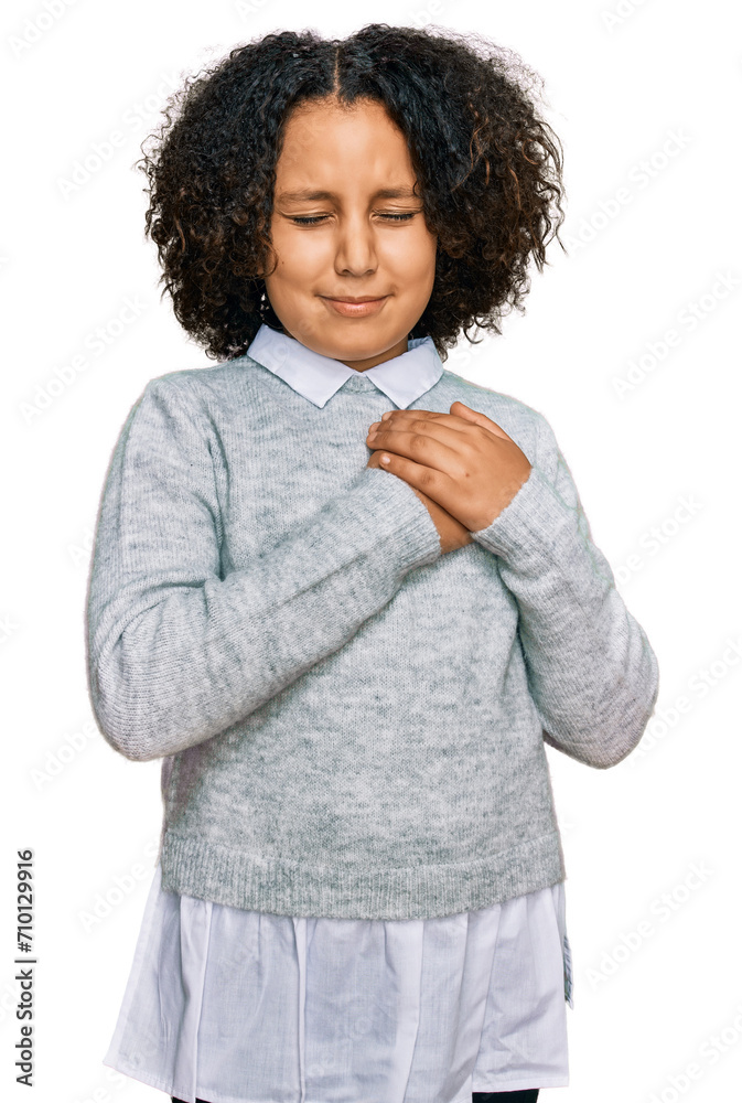 Poster young little girl with afro hair wearing casual clothes smiling with hands on chest with closed eyes