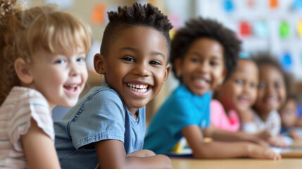 Joyful children sharing a laugh in a vibrant classroom, a snapshot of innocent camaraderie