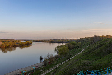 May landscape view of a wide river from an observation deck.