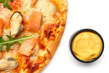 Tasty seafood pizza and sauce isolated on white background, closeup