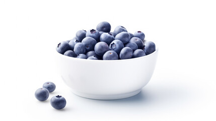 Fresh blueberries arranged in white bowl on table. Perfect for food and nutrition-related content.