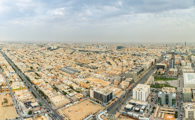 Obraz premium Aerial large panorama of downtown and outskirts of Riyadh city, Al Riyadh, Saudi Arabia
