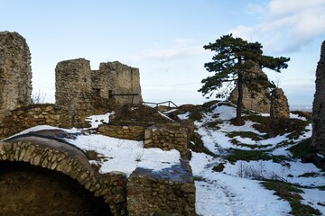 Upper courtyard of the castle ruins in winter. Old Jicin. Czechia.