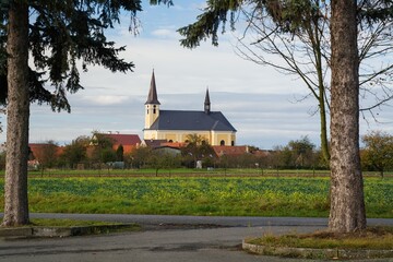 View of the church from the cemetery. Vsechovice. Central Moravia. Czechia.